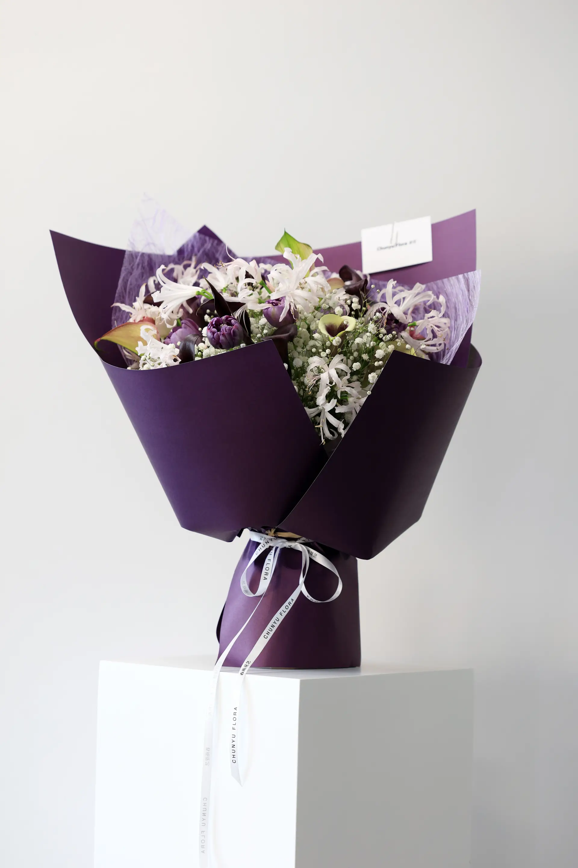 Wrapped mixed flower bouquet